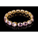 An amethyst bracelet
Set win gold with 16 oval cut amethysts
Portugal, 20th century
(minor wear