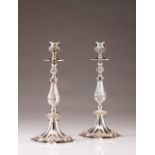 A pair of Portuguese silver candlesticks
Relief, chiseled and engraved decoration in the baroque