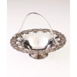 A late 19th, early 20th century Portuguese silver basket
Scalloped, pierced and relief decoration