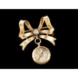 A "compass" brooch
Gold
Designed as bow suspending a "compass" pendant
Faded marks, late 19th, early