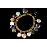 A charm bracelet
Gold chain with 14 pietra-dura heart-shaped charms
Porto assay mark (1938-1984) and