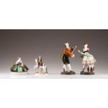 A pair of English porcelain Neapolitan figures

Polychrome porcelain
Marked O. J. Meakin

Height: 31