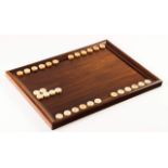 A backgammon and chess board
Teak with thornbush inlaid decoration
Ivory backgammon pieces
Portugal,