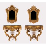 A pair of 19th century European pier tables with mirrors
Carved and gilt wood decorated with