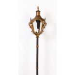 A processional torch
Painted and gilt metal
Portugal, 20th century
(defects)

Height: 200 cm