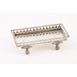 A 19th century Portuguese silver snuffers tray
Pierced gallery, ball and claw feet
Lisboa assay mark