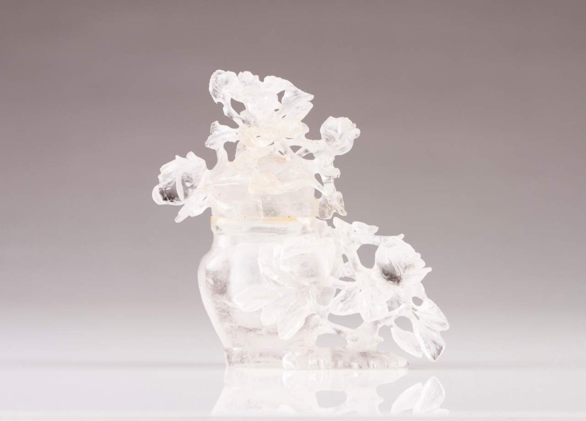 A late 19th, early 20th century carved Rock Crystal Chinese flask with cover
Carved rock crystal