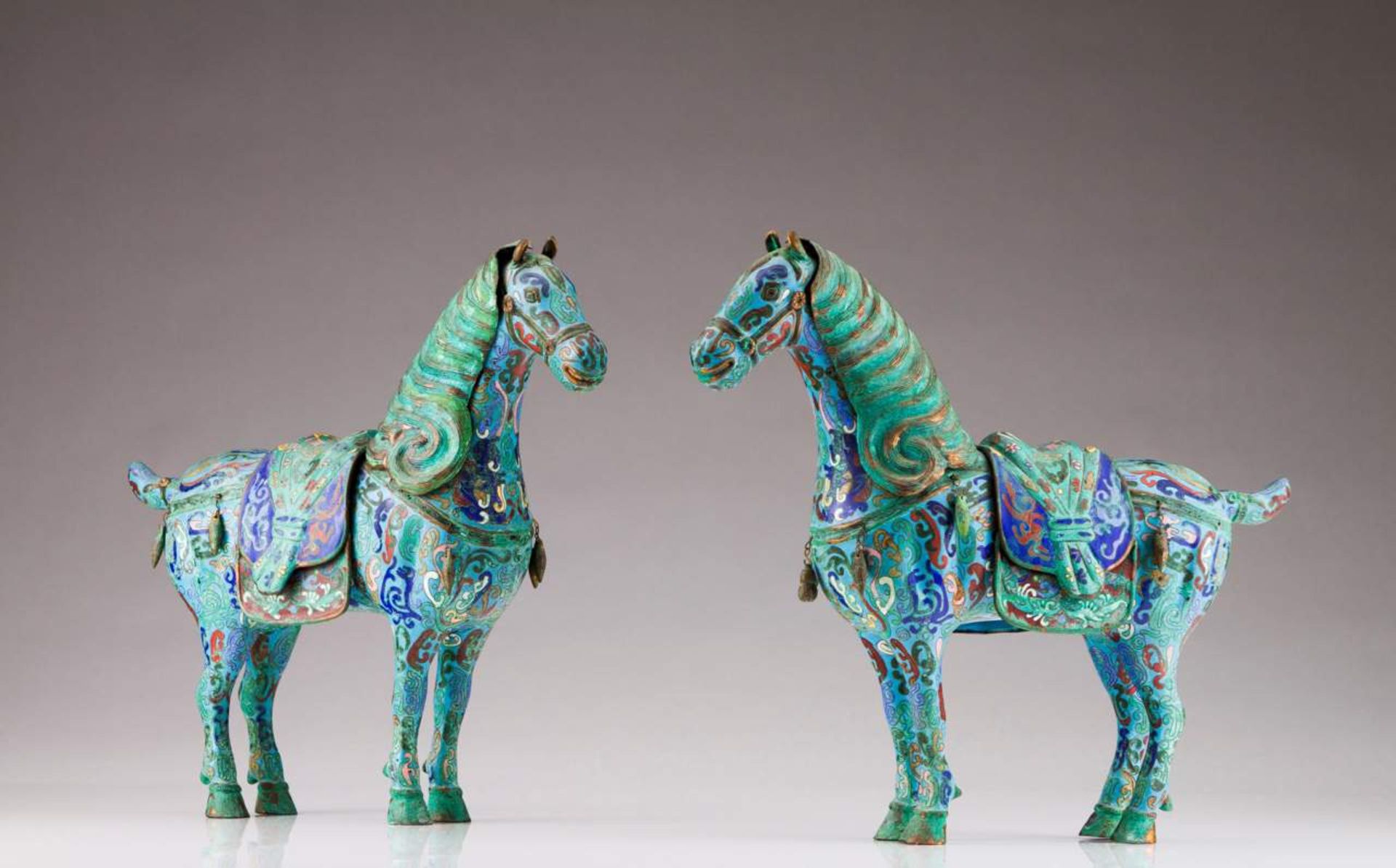 A pair of late 19th, early 20th century Chinese cloisonné sculptures
Representing horses