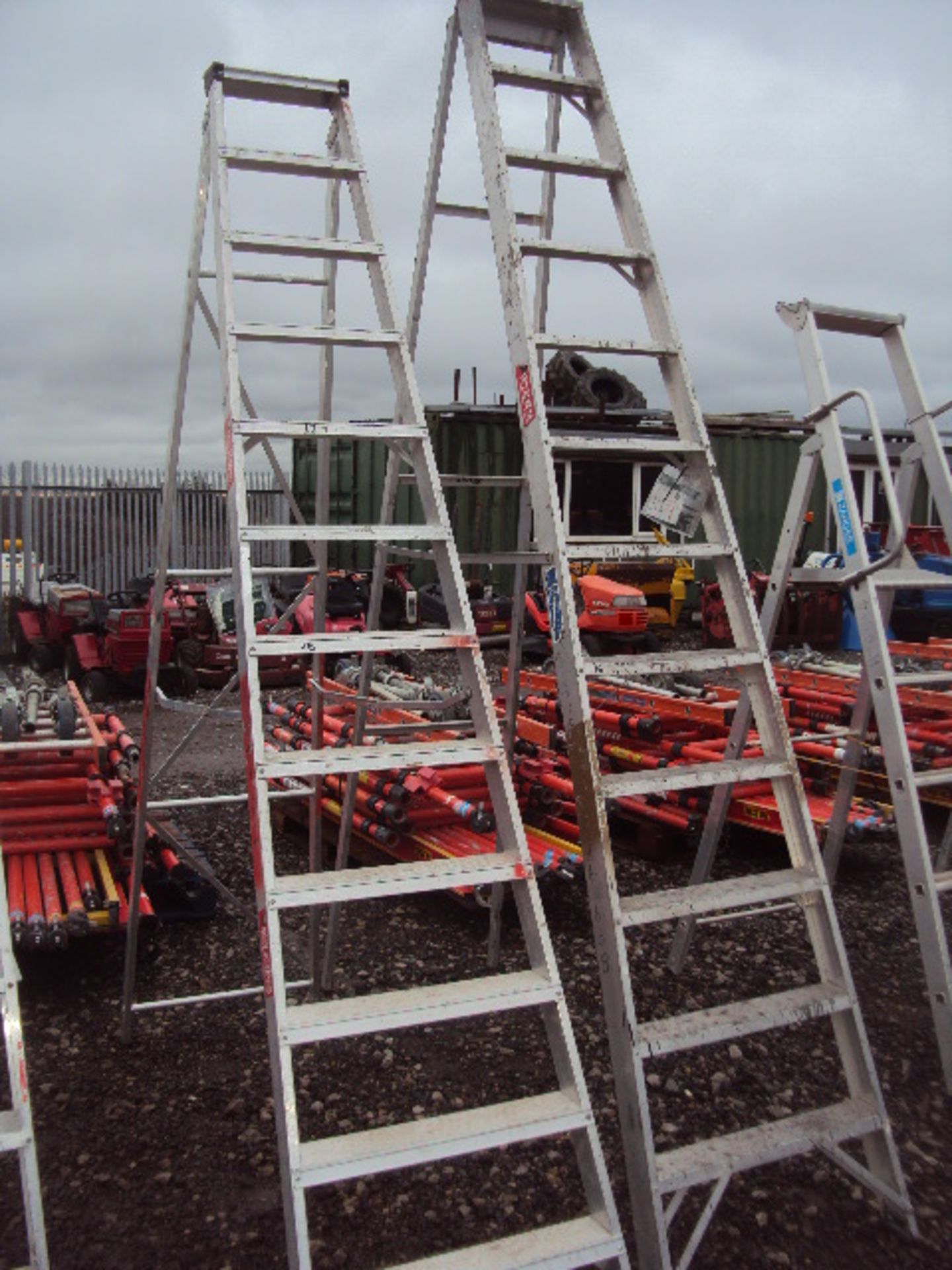 2 x large aluminum step ladders