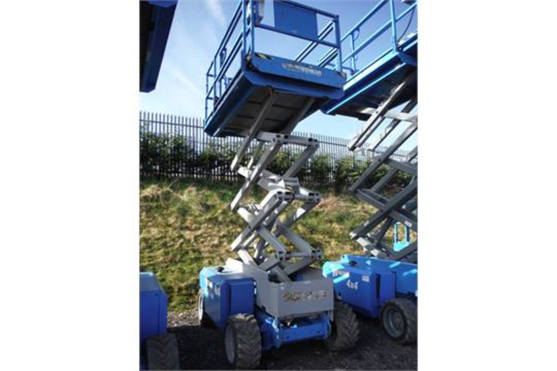 2002 GENIE GS2668RT 4wd scissor lift (1220 rec hrs)(S/n 68-41563)(RDL)