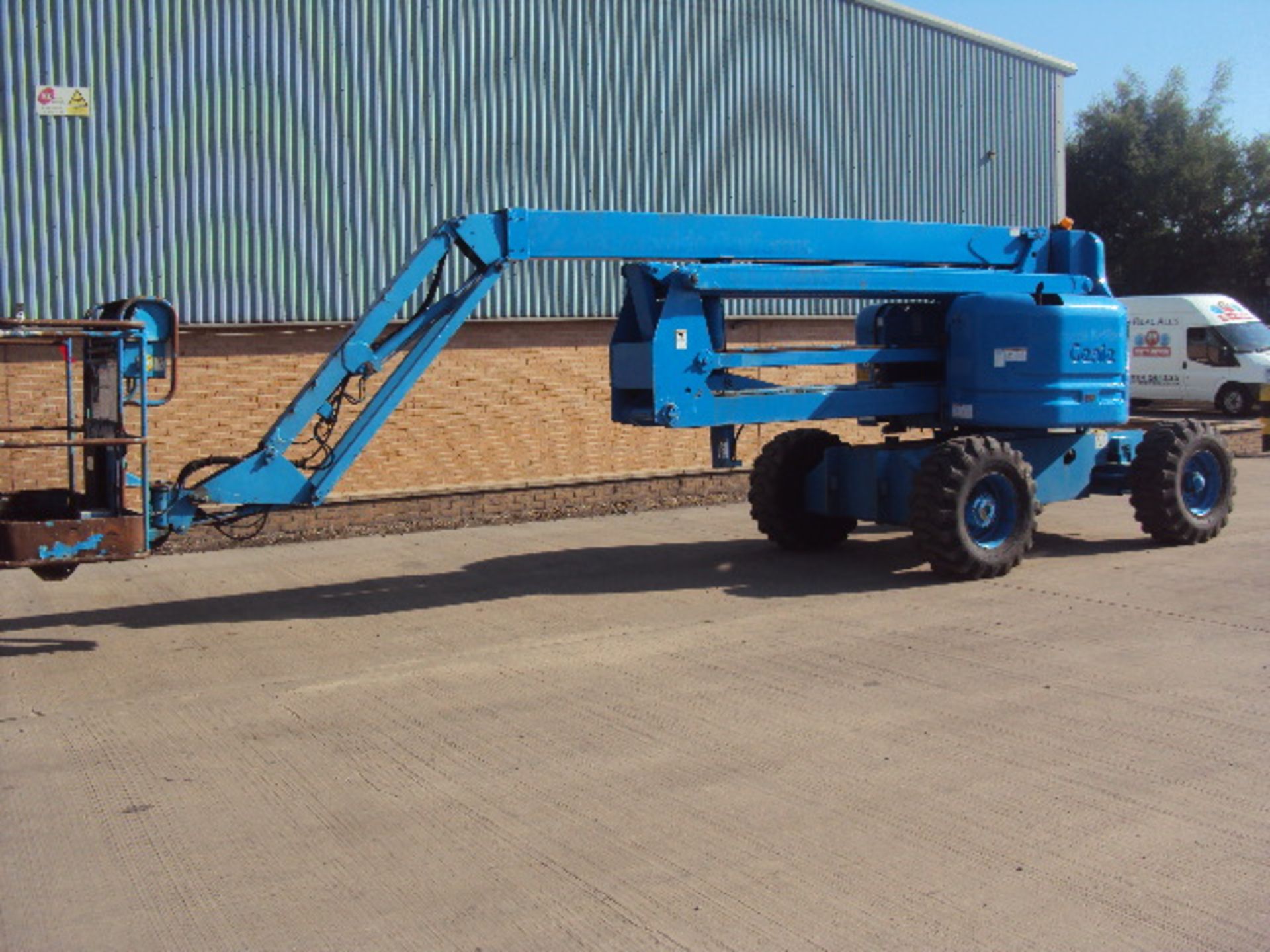 1999 GENIE Z60-34 60' 2wd articulated boom lift S/n: Z60-1983) (4991 recorded hours) (RDL)