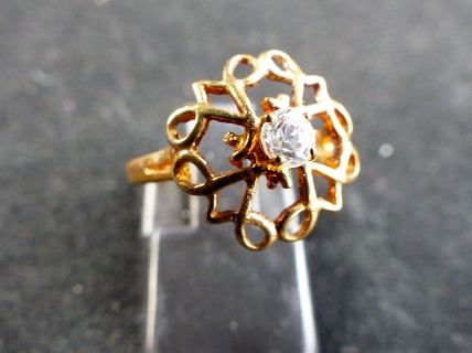 9 ct rose gold stone set openwork ring.