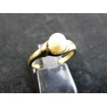 9 ct gold genuine pearl set ring. Size N