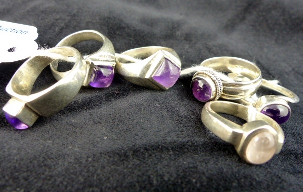 Six sterling silver stone set rings. 35g