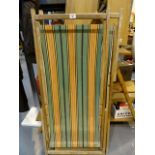 Two vintage fold out sun deck chairs