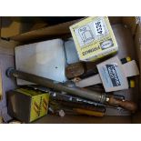 Box of collectable items including vintage tools and first aid kit