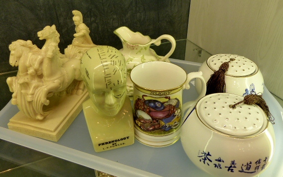Tray of mixed ceramics including cast roman statue