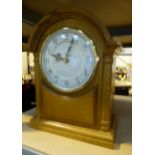 Large wooden mantle clock.