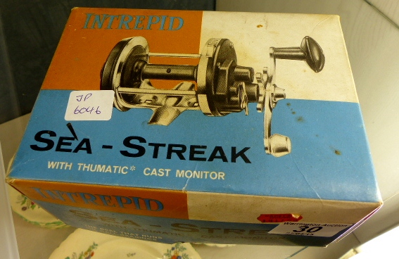 Boxed Intrepid Seastreak multiplier fishing reel.