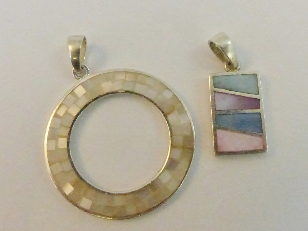 Two sterling silver mother of pearl pendants