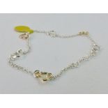 Sterling silver bracelet with gold plated hearts,
