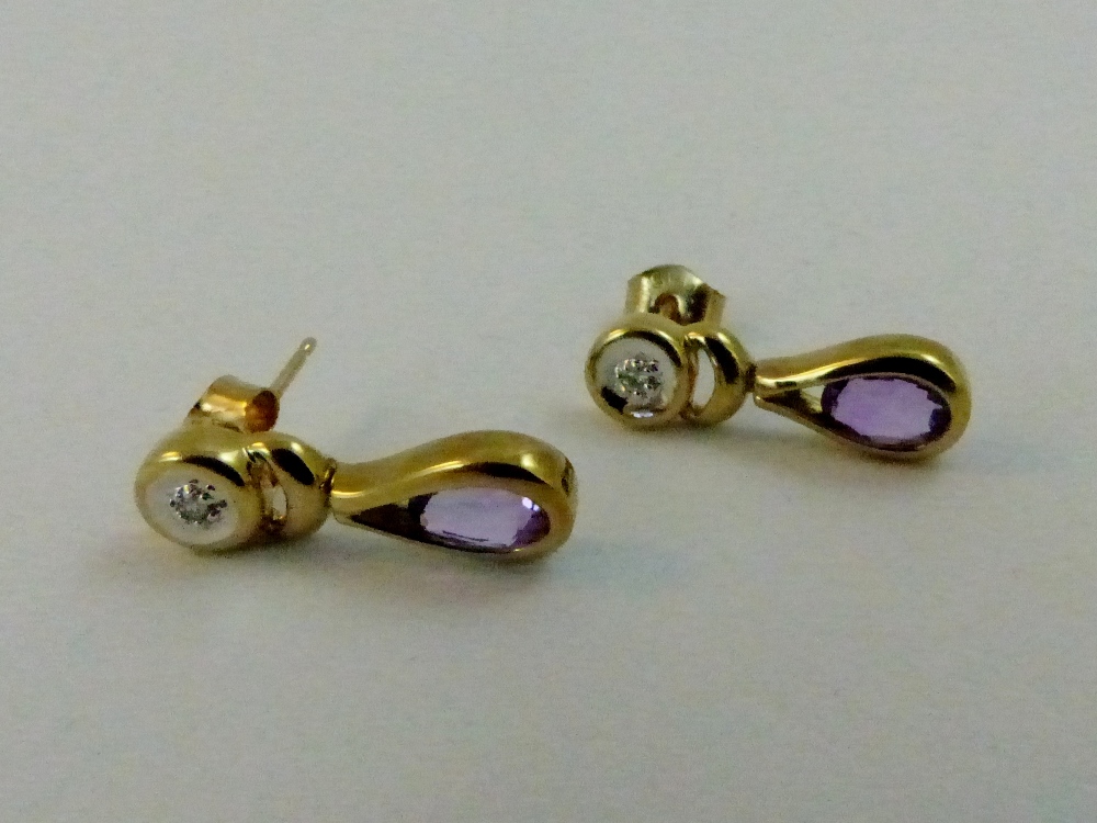 9 ct gold pear cut amethyst and diamond earrings