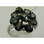 9 ct white gold green sapphire set ring. Size O 23g.