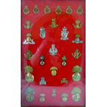 28 military cap badges including Royal Dublin Fusiliers and Bengal  Fusiliers,