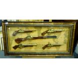 Reproduction antique firearms framed and glazed