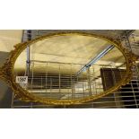 Gilt framed oval mirror