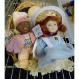 Basket of collectable dolls