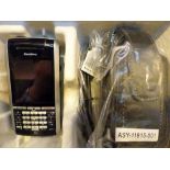 Boxed Blackberry mobile phone with accessories
