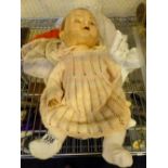 Vintage ceramic headed doll with quantity of original clothing