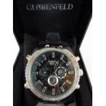 New boxed Globenfeld black faced multi dial stainless steel wristwatch, black and chrome strap.