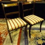 Set of six Regency style mahogany dining chairs with brass insert design