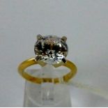 CZ ring on gold plated silver band size O.