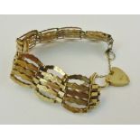 9 ct gold five bar gate bracelet 11.