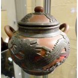Chinese red stoneware twin handled lidded pot with pierced pewter dragon decoration