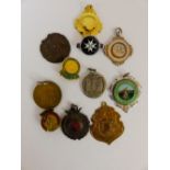 Quantity of watch fobs and badges