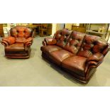 Ox blood leather three seater settee and armchair by Thomas Lloyd