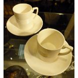 Two Keith Murray Moonstone Wedgwood coffee cups with saucers.