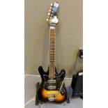 Electric six string guitar unnamed with black and orange body