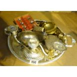 Tray of mixed silver plate and brass items including glass covered part hole ashtray.