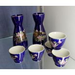 Japanese Saki set with two decanters and signature to base