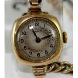 9 ct gold ladies wristwatch with rolled gold bracelet