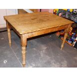Heavy pine kitchen table on turned legs,