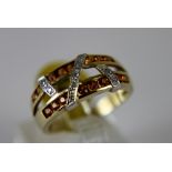 9 ct two row orange stone and diamond ring,