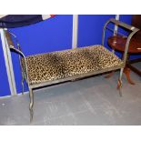 Wrought iron two person conservatory seat with faux leopard skin cushion
