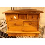 Set of small table top pine drawers