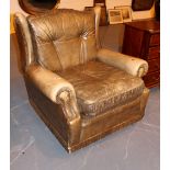 Vintage gold leather arm chair